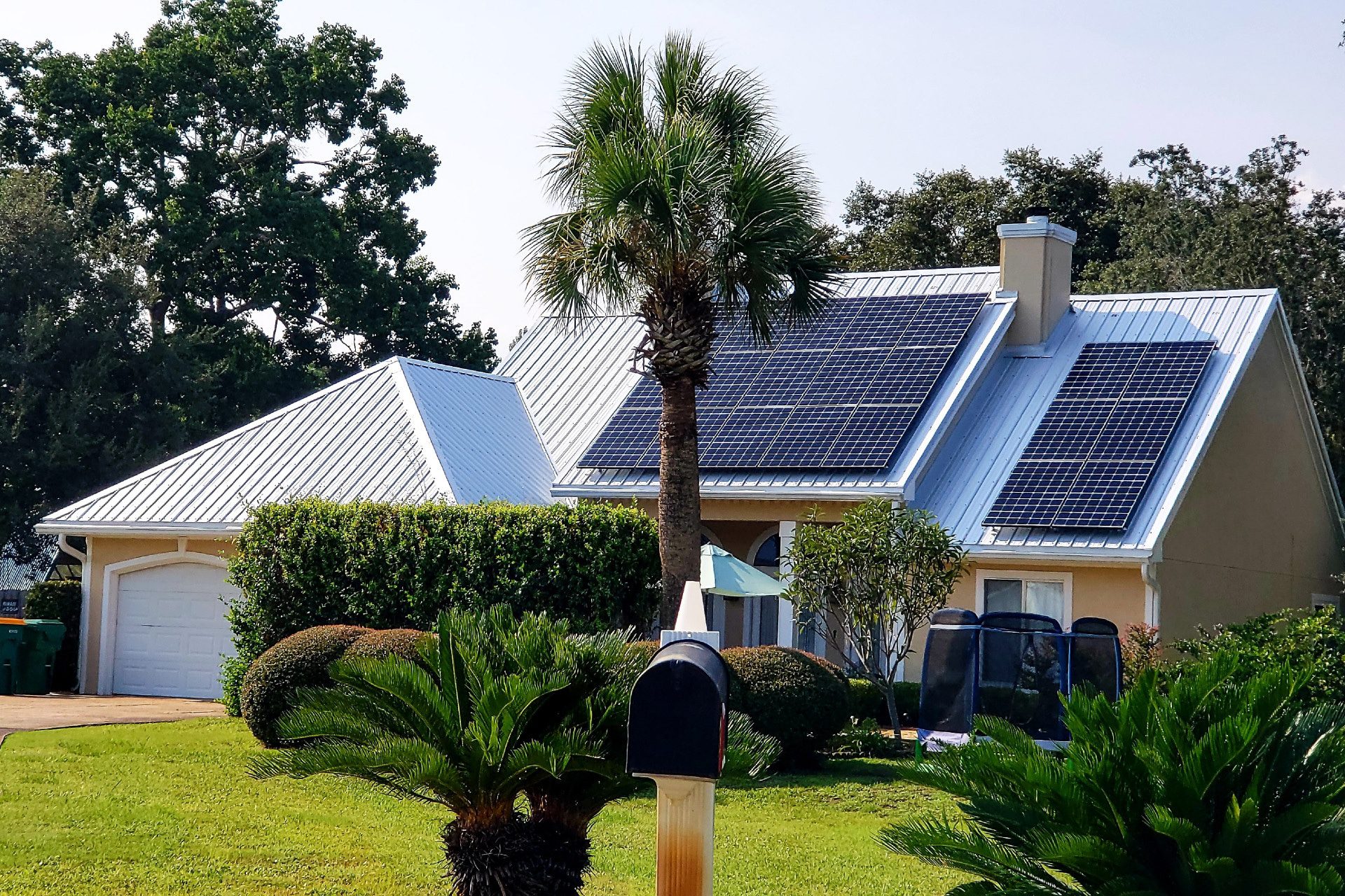 image of house with solar panels installed on roof